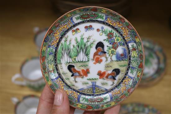 A set of Chinese famille rose cockerel cups, saucers and plates, early 20th century